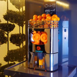 a bunch of oranges are in a machine at Bohem Art Hotel in Budapest +49 photos