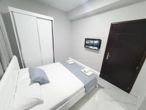 Postel nebo postele na pokoji v ubytování IL MIO