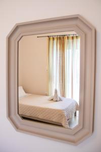 Postel nebo postele na pokoji v ubytování Mystique Apartment