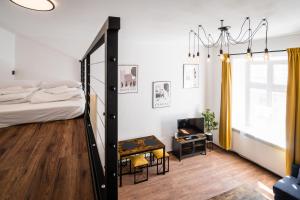 Posteľ alebo postele v izbe v ubytovaní Dajwor Residence Jewish Quarter WAWELOFTS