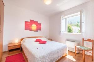 Ein Bett oder Betten in einem Zimmer der Unterkunft Villa Panorama Dubrovnik