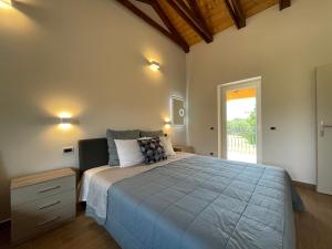 Posteľ alebo postele v izbe v ubytovaní VILLA BERTO + 37 fotografií