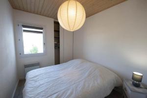 Posteľ alebo postele v izbe v ubytovaní Maison pour 4 pers - Terrasse - 300m de la plage