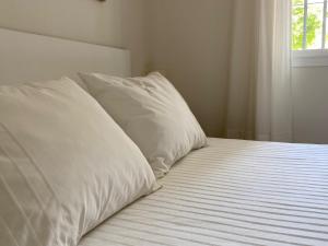 A bed or beds in a room at APARTAMENTO PLAZA ESPAÑA