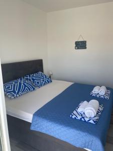 Ein Bett oder Betten in einem Zimmer der Unterkunft Villa Iva Vodice