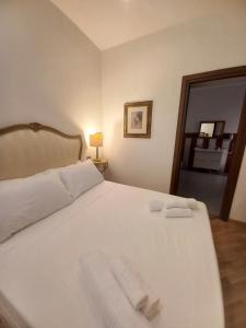Postel nebo postele na pokoji v ubytování Casa Altieri