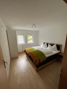 Łóżko lub łóżka w pokoju w obiekcie Armelen Villa