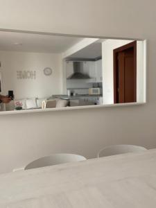 A kitchen or kitchenette at APARTAMENTO PLAZA ESPAÑA