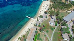 an aerial view of a beach and the ocean at Xenia Ouranoupolis in Ouranoupoli