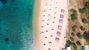 an aerial view of the beach and the ocean at Xenia Ouranoupolis in Ouranoupoli