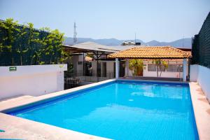 Bazén v ubytování Acapulco Amor nebo v jeho okolí