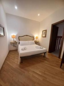 Postel nebo postele na pokoji v ubytování Casa Altieri