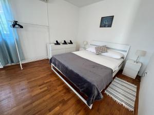 Postel nebo postele na pokoji v ubytování Apartments Antolkovic