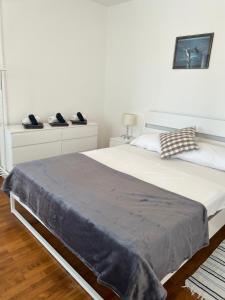 Postel nebo postele na pokoji v ubytování Apartments Antolkovic