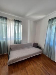 Postel nebo postele na pokoji v ubytování Apartments Antolkovic