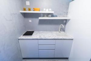 Virtuvė arba virtuvėlė apgyvendinimo įstaigoje Apartment Porin