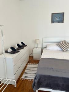 Postel nebo postele na pokoji v ubytování Apartments Antolkovic