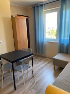Postel nebo postele na pokoji v ubytování Pokoje Gościnne - Apartamenty MATI