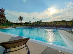 The swimming pool at or close to Garda Di Vino Agricamping & Wine Shop Lazise