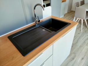 A kitchen or kitchenette at Garda Di Vino Agricamping & Wine Shop Lazise