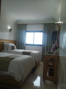 Majliss Hotel Downtown客房内的一张或多张床位
