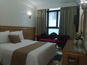Majliss Hotel Downtown客房内的一张或多张床位