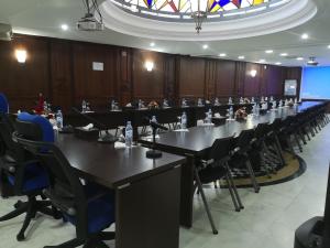 a meeting room with a long table and chairs at Majliss Hotel Downtown in Rabat