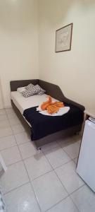Postel nebo postele na pokoji v ubytování Hotel Tassos-Despina