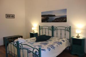 Postel nebo postele na pokoji v ubytování Casina Elio