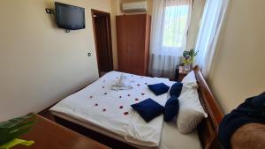 Postel nebo postele na pokoji v ubytování El Locanda Boutique Hotel + 82 fotografií