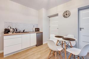 Η κουζίνα ή μικρή κουζίνα στο Central Platinum Apartments 23