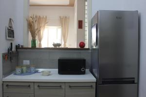 Kuchyň nebo kuchyňský kout v ubytování Casina Elio