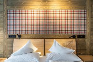 Postel nebo postele na pokoji v ubytování Hotel OTP Birkenhof