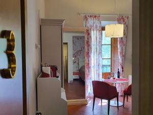 Postel nebo postele na pokoji v ubytování RF Duomo suites
