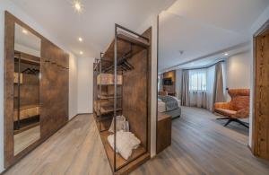 Rúm í herbergi á Hotel Comploj Adults only