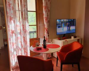 TV a/nebo společenská místnost v ubytování RF Duomo suites