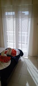 Postel nebo postele na pokoji v ubytování Hotel Tassos-Despina