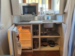 Kuchyň nebo kuchyňský kout v ubytování RF Duomo suites