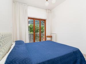 Postel nebo postele na pokoji v ubytování Marea Suite - De Vivo Realty Sorrento