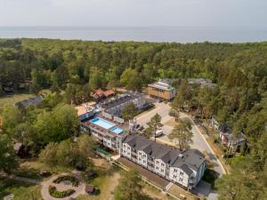 Bazén v ubytovaní Poddąbek Comfort I Apartamenty z tarasem na dachu, ogródkiem, basenem zewnętrznym i wewnętrznym, salą zabaw i animacjami alebo v jeho blízkosti
