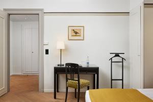 Postel nebo postele na pokoji v ubytování Hotel Victoria