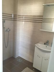 Koupelna v ubytování Apartmány Dimitra 2 + 3 fotografie