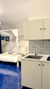 Kuchyň nebo kuchyňský kout v ubytování Residence Villa Giordano sea view Amalfi Coast