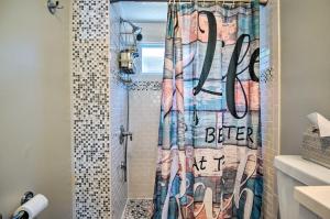 a shower curtain that says better thanoit in a bathroom at Wareham Cottage with Deck, Walk to Swifts Beach in Wareham +18 photos