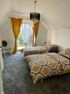 Voodi või voodid majutusasutuse Hostel Wilanów toas
