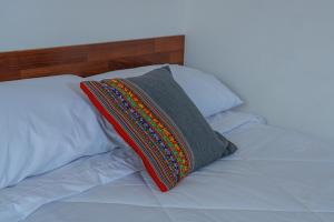 Letto o letti in una camera di Rituales Inn Cusco - San Blas