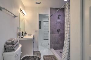 a bathroom with a shower and a toilet and a sink at Pet-Friendly Miami House about 8 Mi to Beaches! in Miami +18 photos