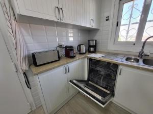 A kitchen or kitchenette at Torredembarra cosy, well equipped house, 5 min. from the beach