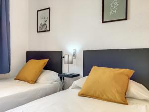 Łóżko lub łóżka w pokoju w obiekcie Ribera Beach 1 - 2906