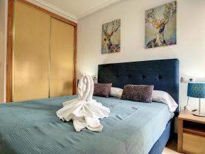 Łóżko lub łóżka w pokoju w obiekcie Ribera Beach 1 - 2906